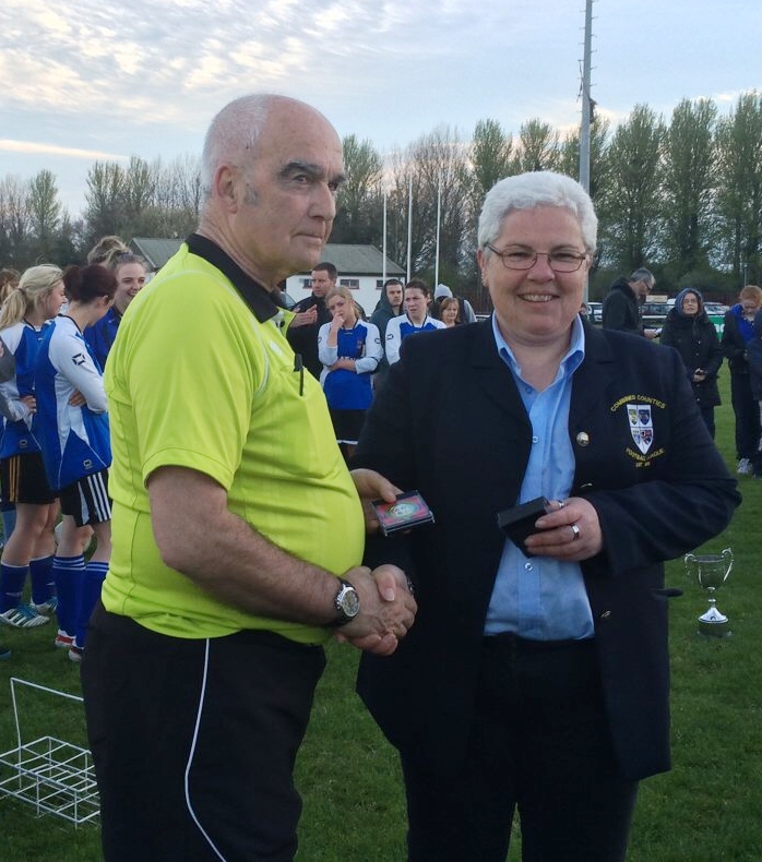 Triona MacDarby CCFL League Treasurer presents Paddy Nolan with his Cup medal Paddy's last game after 44 years - Thanks Paddy for all your great service